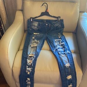 COVERGIRL Blue Distressed Skinny Jeans
